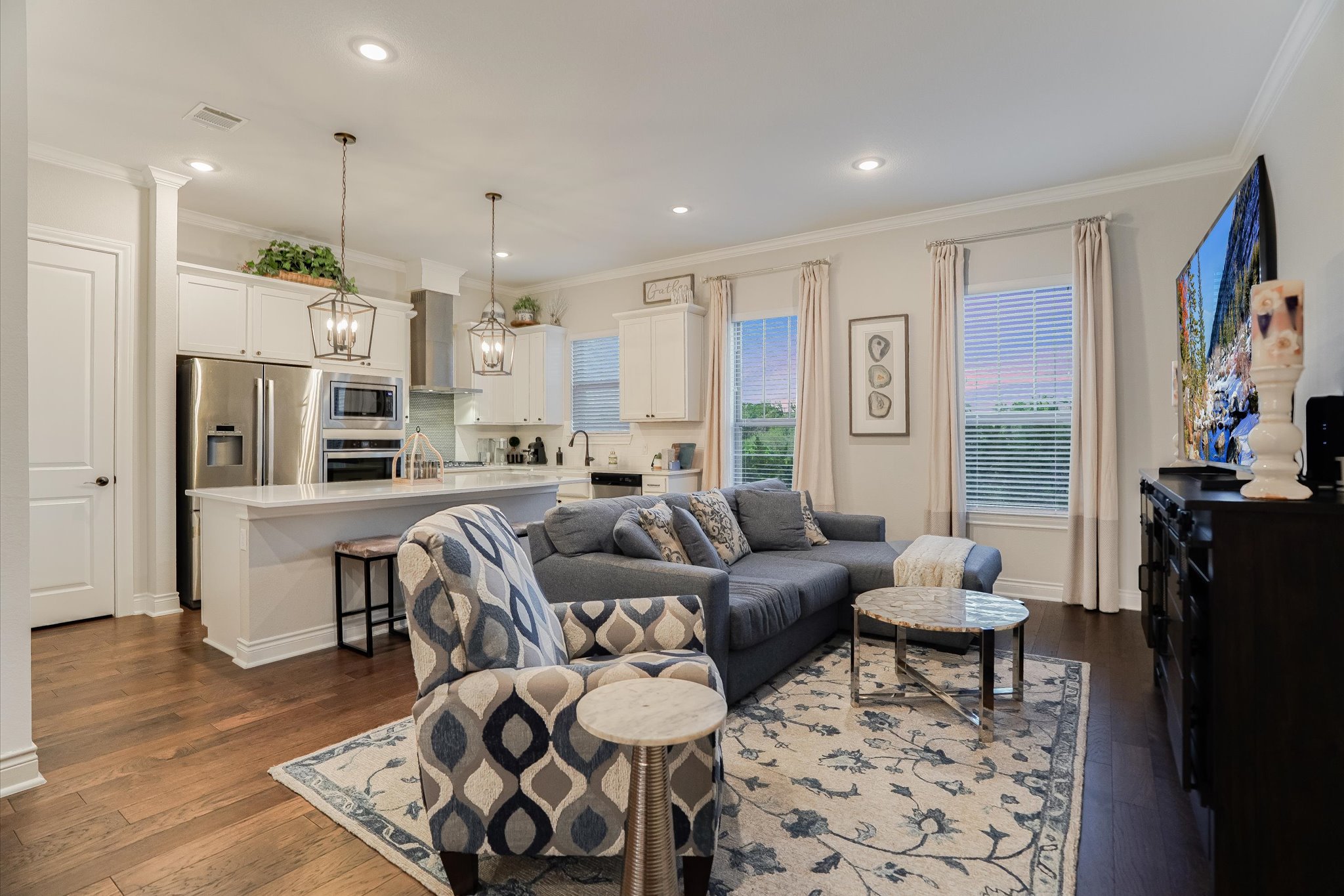 309 Adams Street Georgetown, TX 78628 - Photo 4 of 30 Living area featuring dark wood-type flooring, recessed lighting, and crown molding