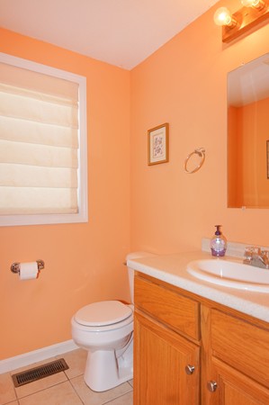 53 Lancaster Road, Unit 10 Clinton, MA 01510 - Photo 7 of 20 a bathroom with a sink a toilet and mirror