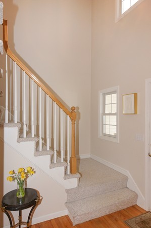 53 Lancaster Road, Unit 10 Clinton, MA 01510 - Photo 8 of 20 a view of a entryway with flower pots