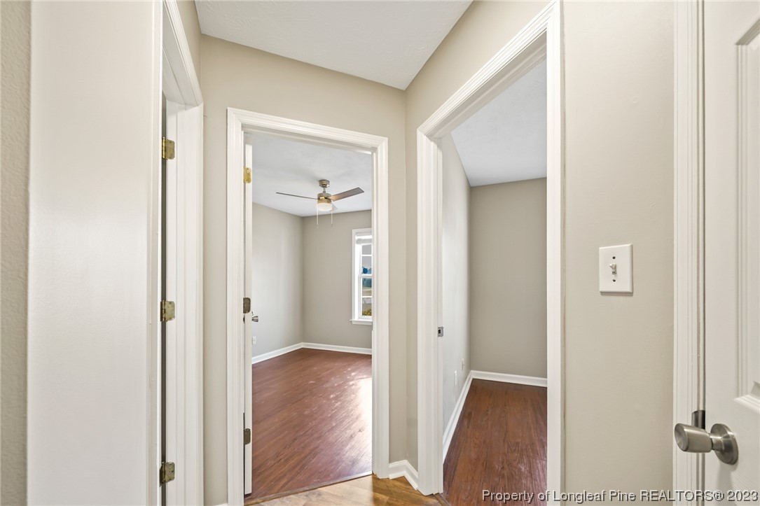 149 Cavalier Drive Raeford, NC 28376 - Photo 20 of 31 a view of a hallway with wooden floor