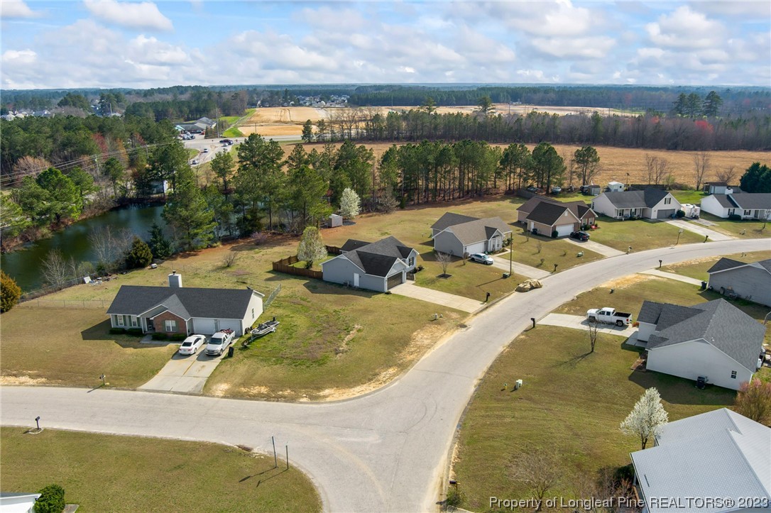 149 Cavalier Drive Raeford, NC 28376 - Photo 27 of 31 a view of swimming pool with lake view and mountain view