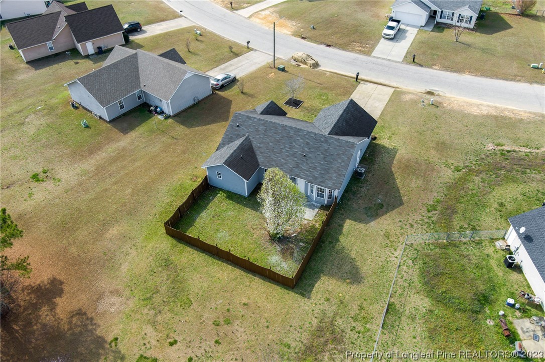 149 Cavalier Drive Raeford, NC 28376 - Photo 30 of 31 swimming pool with view of residential house and swimming pool