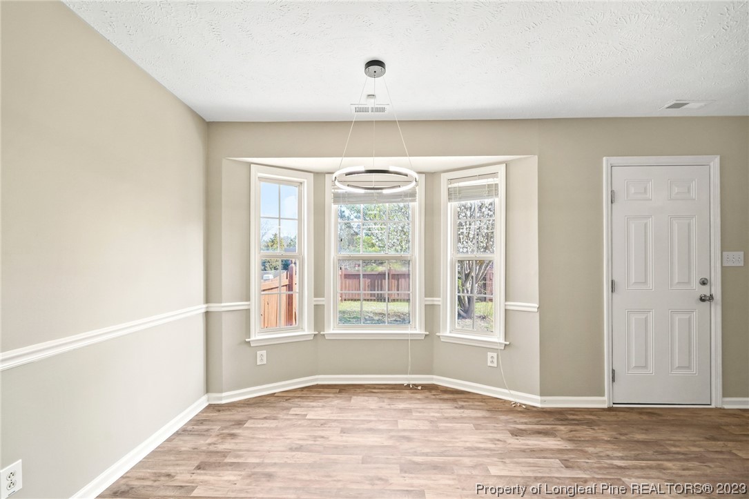 149 Cavalier Drive Raeford, NC 28376 - Photo 9 of 31 a view of an empty room with a window