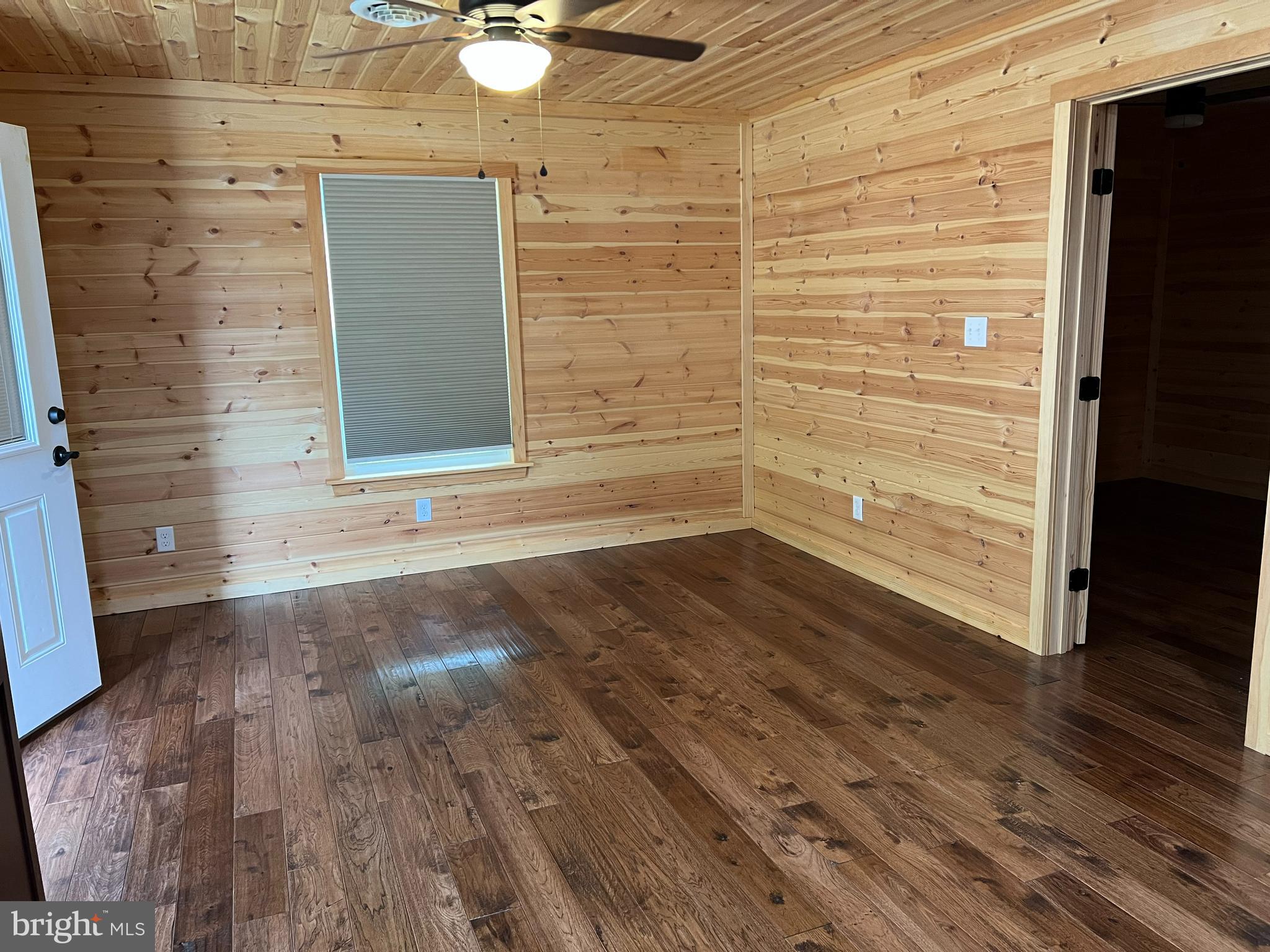 140 McCoy Road Berkeley Springs, WV 25411 - Photo 9 of 35 Pine walls and Ceiling