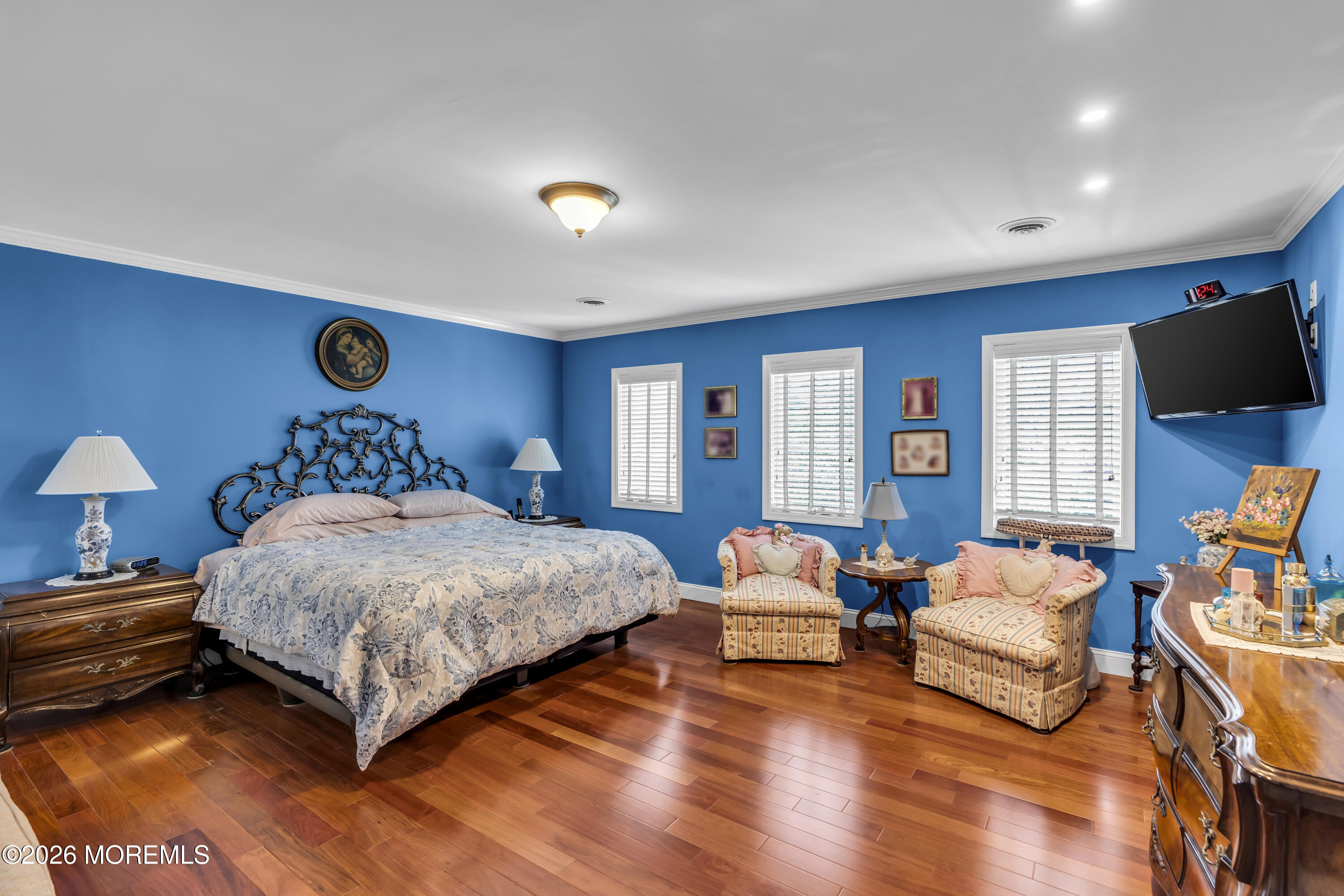 165 Kingsley Street Long Branch, NJ 07740 - Photo 28 of 55 a bedroom with a bed and wooden floor