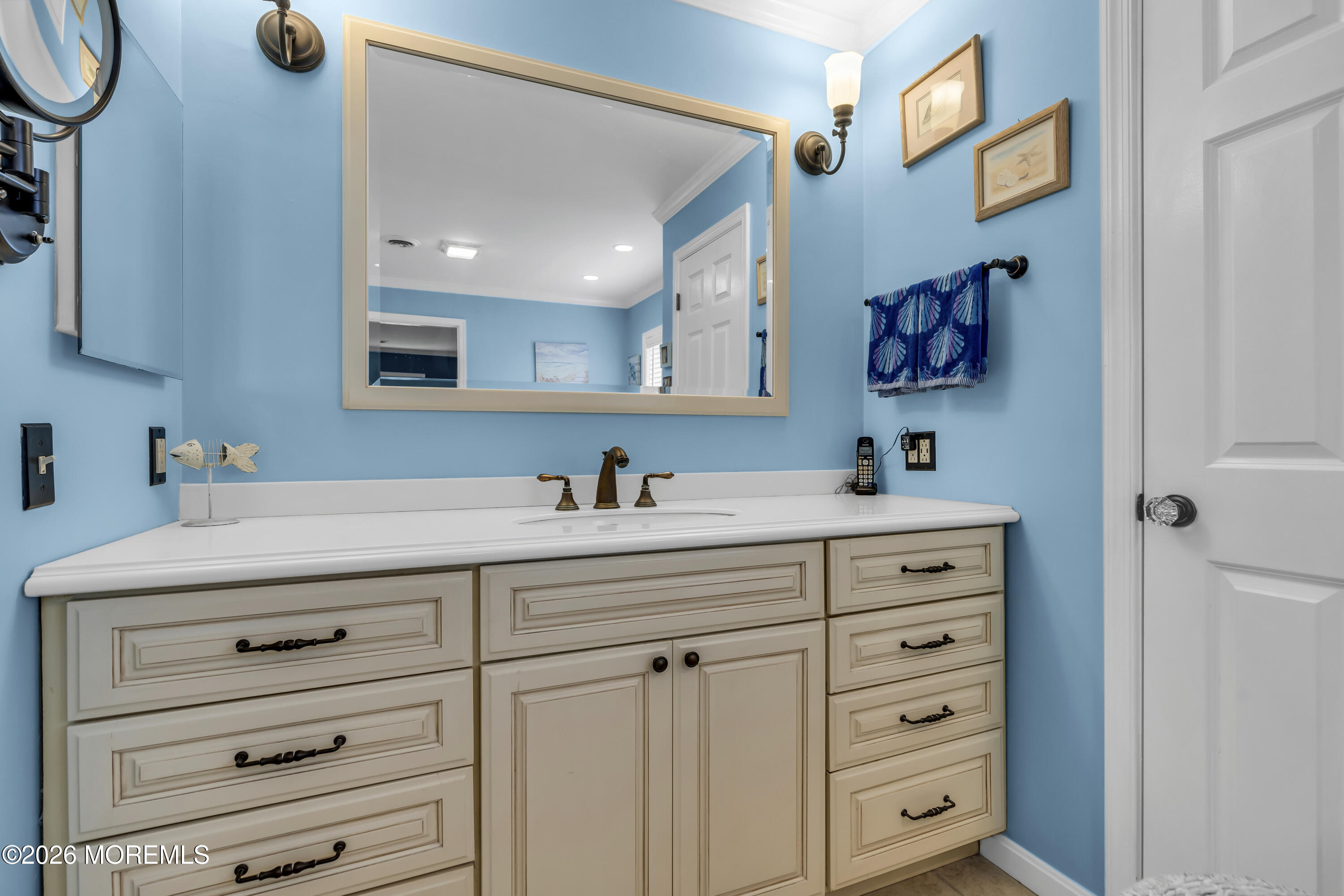 165 Kingsley Street Long Branch, NJ 07740 - Photo 34 of 55 a bathroom with a sink mirror and vanity