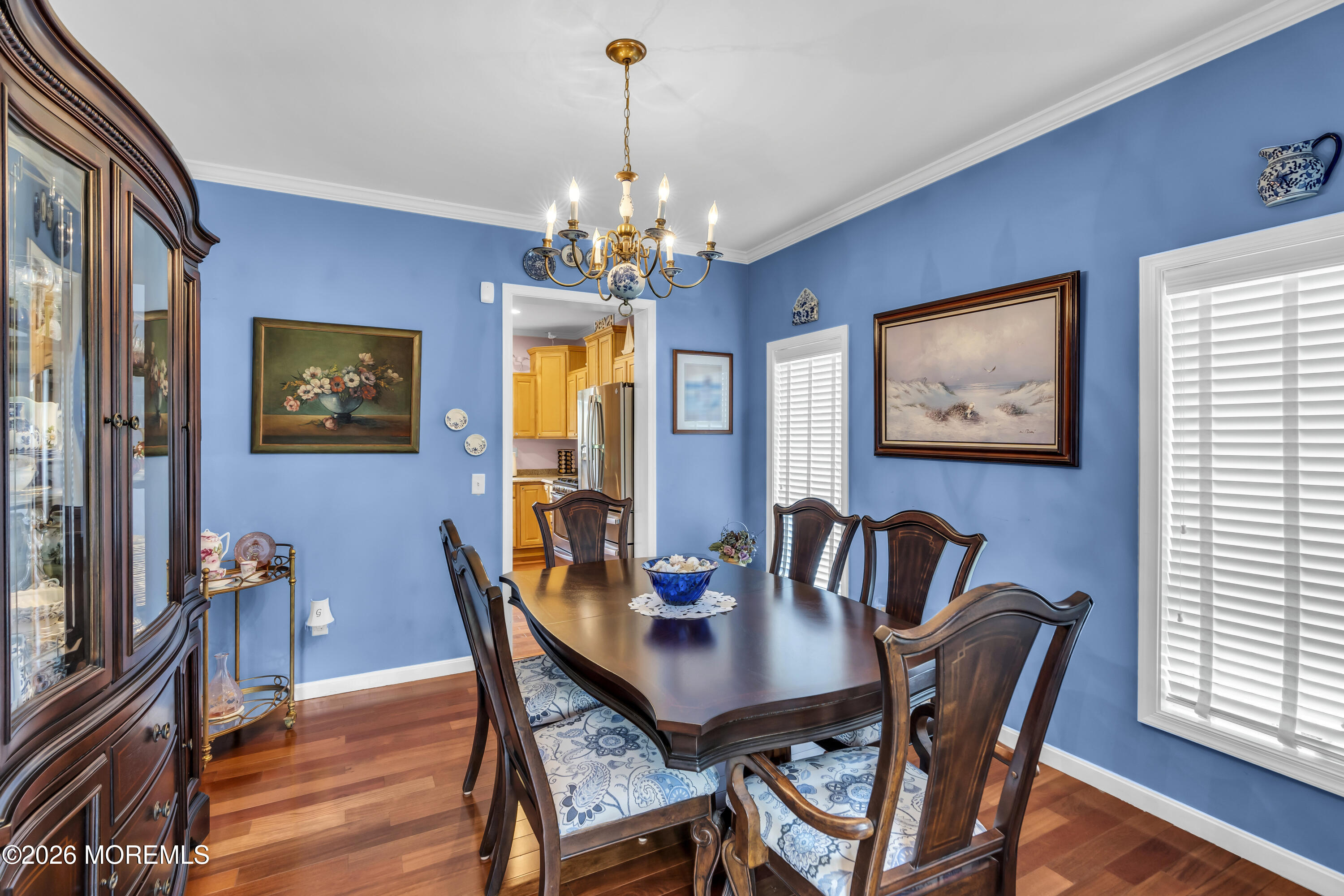 165 Kingsley Street Long Branch, NJ 07740 - Photo 47 of 55 a view of a dining room with furniture wooden floor and a chandelier