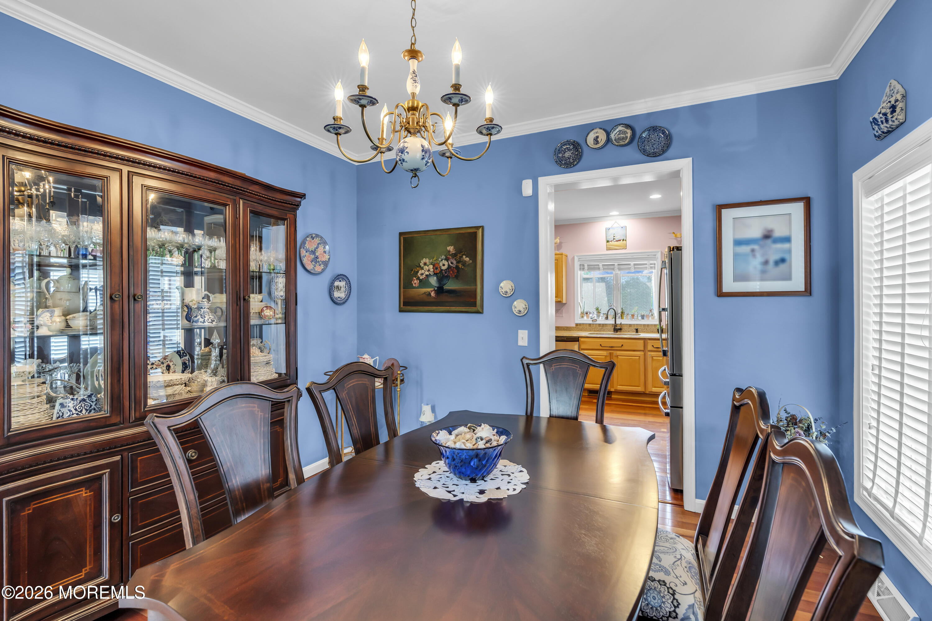 165 Kingsley Street Long Branch, NJ 07740 - Photo 48 of 55 a view of a dining room with furniture a chandelier and large windows