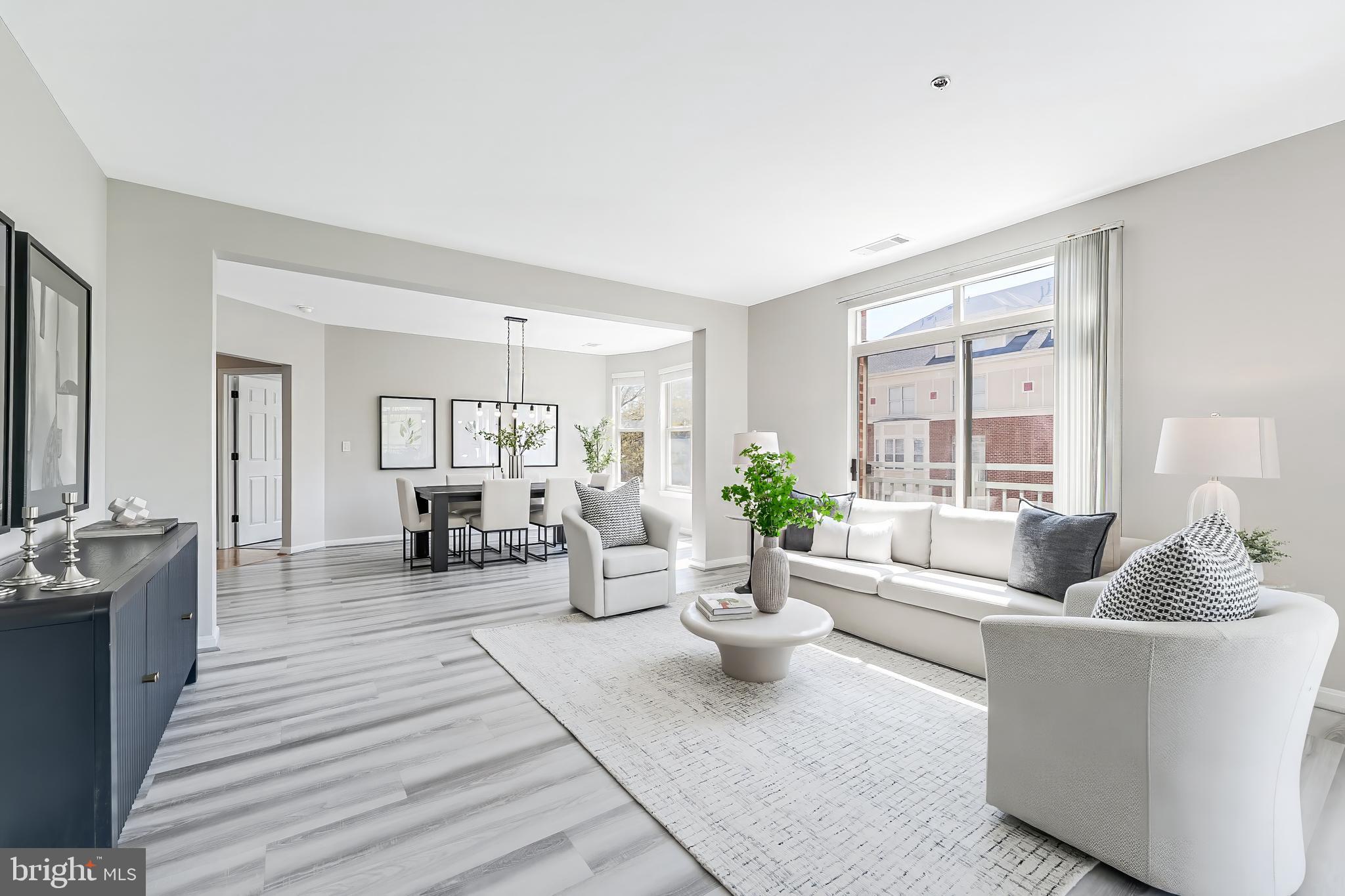 1851 Stratford Park Place, Unit 212 Reston, VA 20190 - Photo 18 of 45 a living room with furniture and view of potted plants
