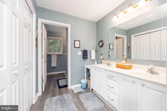 a living room with furniture and closet
