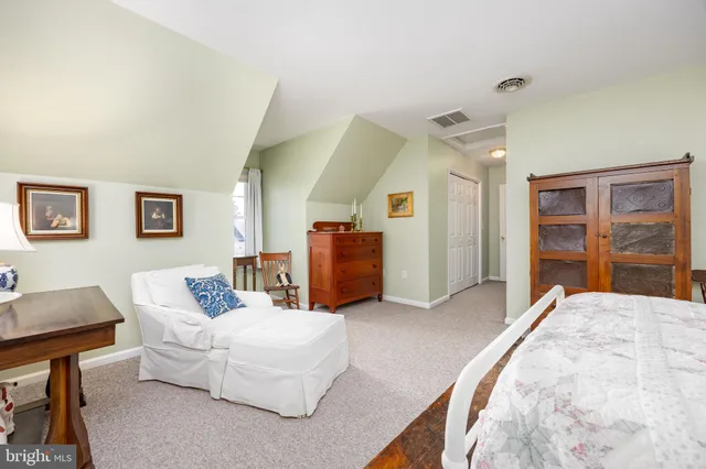 a en suite bathroom with a sink and a mirror