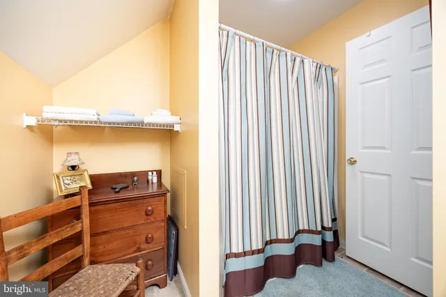 a view of a house with swimming pool and a yard