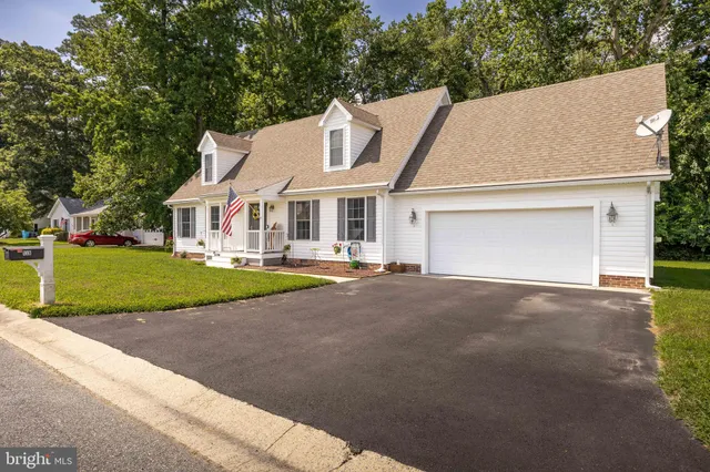 a view of house with outdoor space and street view