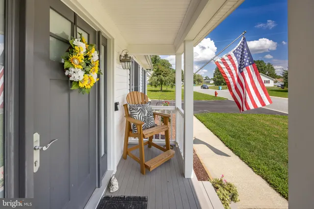 a view of an living room and dining room