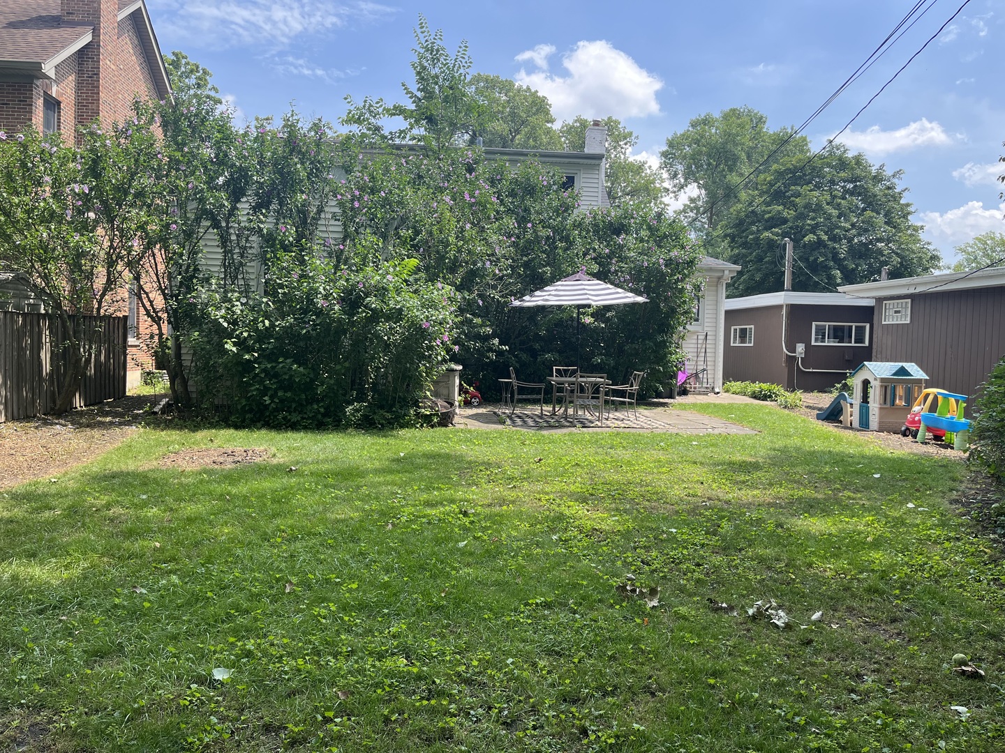 832 Sylviawood Avenue Park Ridge, IL 60068 - Photo 25 of 29 a view of a backyard with a garden and trees