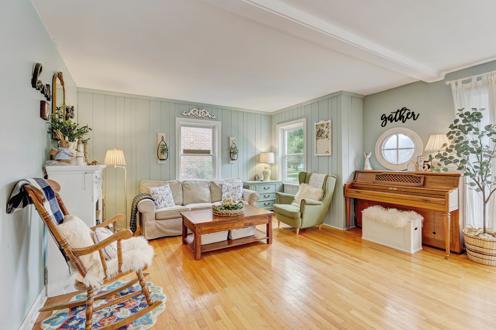 832 Sylviawood Avenue Park Ridge, IL 60068 - Photo 3 of 29 a living room with furniture and a fireplace