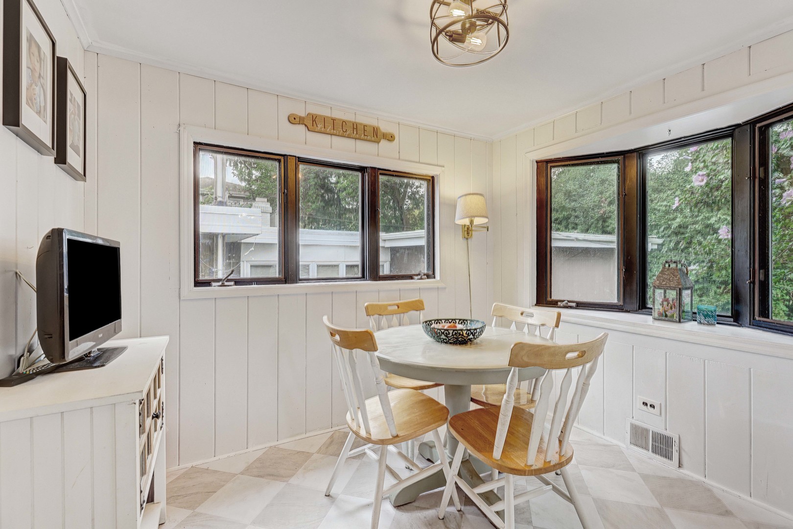 832 Sylviawood Avenue Park Ridge, IL 60068 - Photo 8 of 29 a view of a dining room with furniture window and outside view