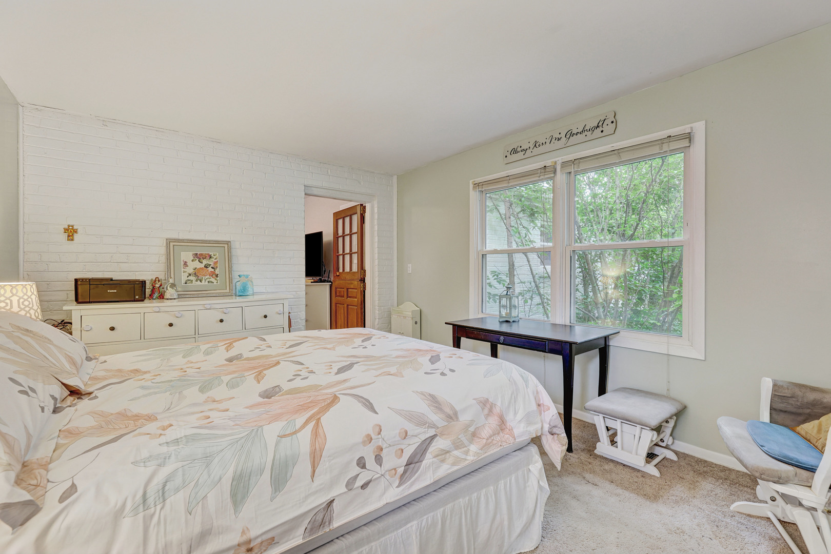 832 Sylviawood Avenue Park Ridge, IL 60068 - Photo 10 of 29 a bedroom with a bed and a table in it