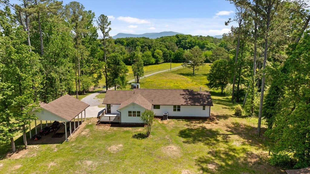 446 Brown Bridge Road Chatsworth, GA 30705 - Photo 2 of 75 an aerial view of a house with swimming pool and garden view