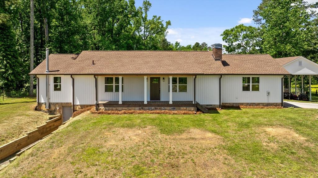 446 Brown Bridge Road Chatsworth, GA 30705 - Photo 28 of 75 front view of a house with a swimming pool