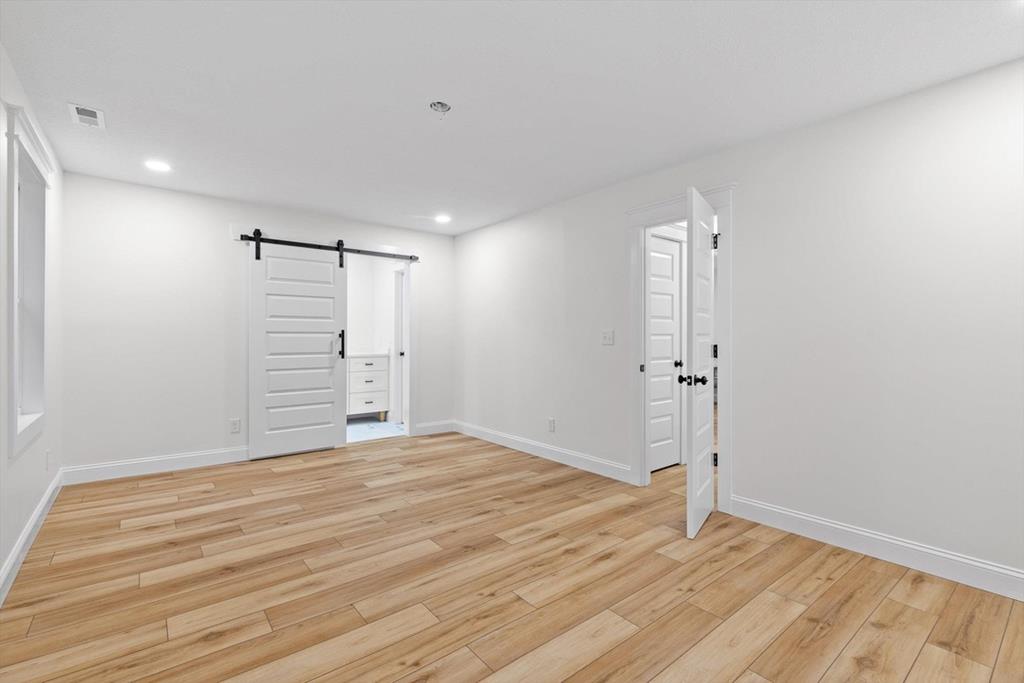 446 Brown Bridge Road Chatsworth, GA 30705 - Photo 62 of 75 a view of an empty room with closet and a bathroom