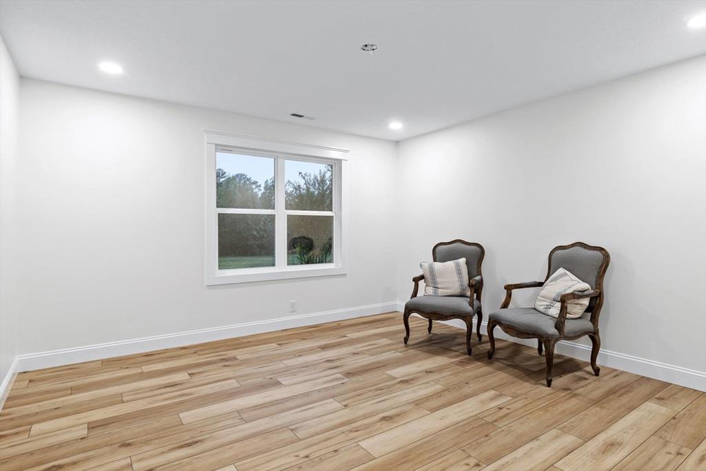 446 Brown Bridge Road Chatsworth, GA 30705 - Photo 64 of 75 a living room with furniture and two window