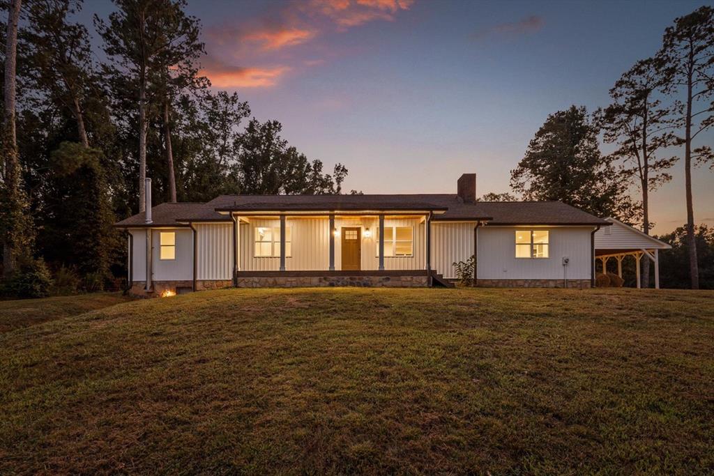 446 Brown Bridge Road Chatsworth, GA 30705 - Photo 67 of 75 a front view of a house with yard and trees