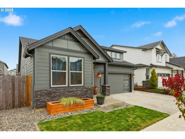 a front view of a house with yard