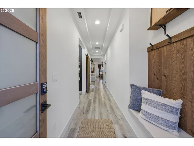 a view of entryway with wooden floor