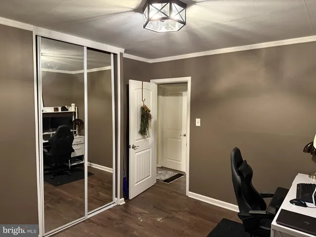 a view of a livingroom with wooden floor