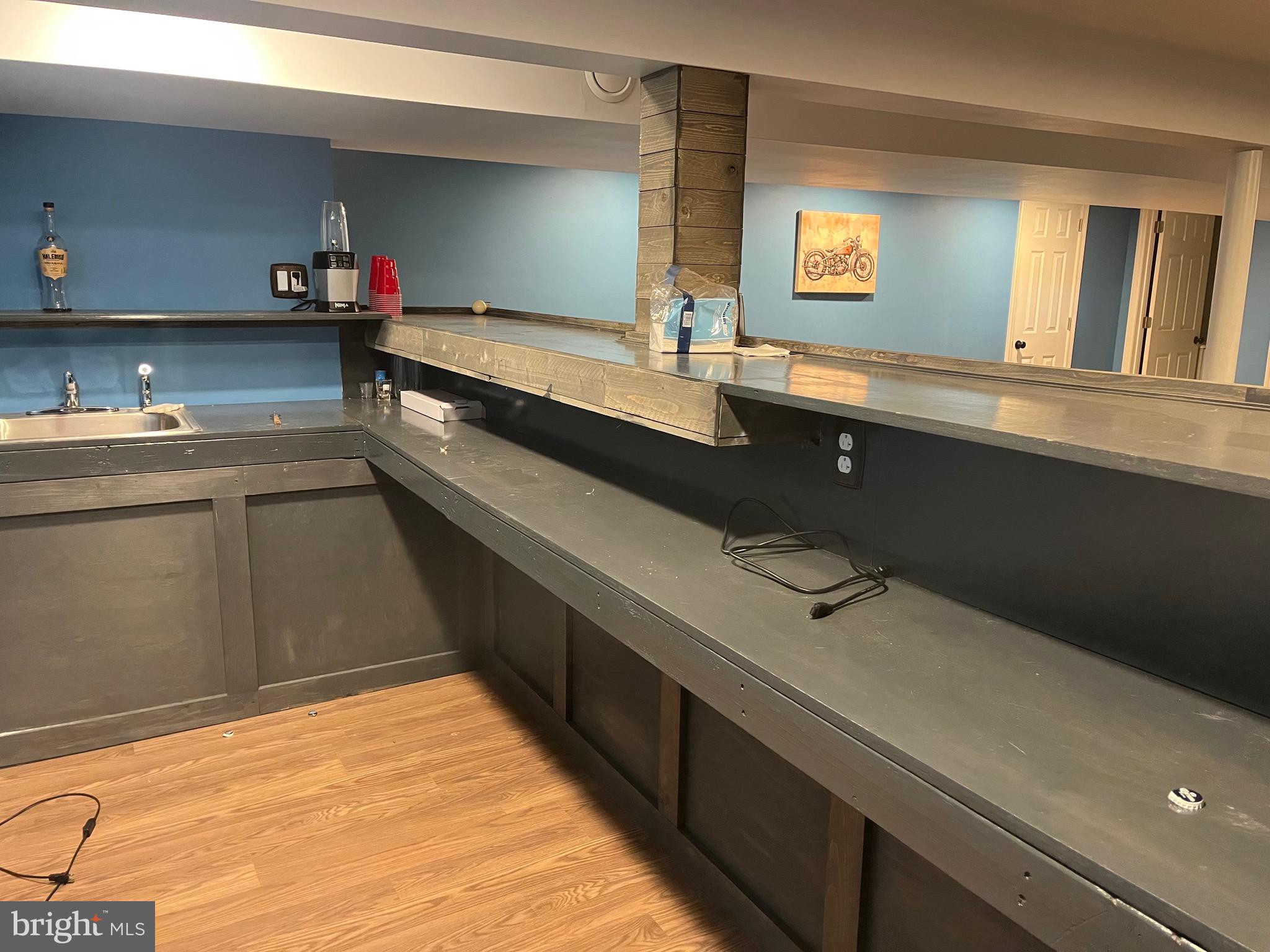 510 Johnson Place Magnolia, NJ 08049 - Photo 35 of 42 a kitchen with a sink and cabinets