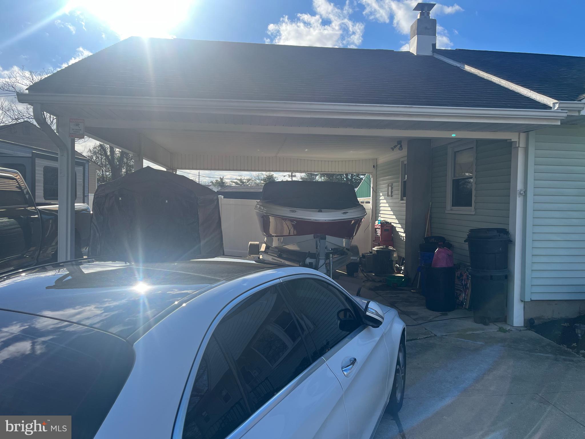 510 Johnson Place Magnolia, NJ 08049 - Photo 36 of 42 a living room with furniture and a chandelier