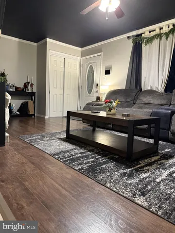 a living room with a couch and a table