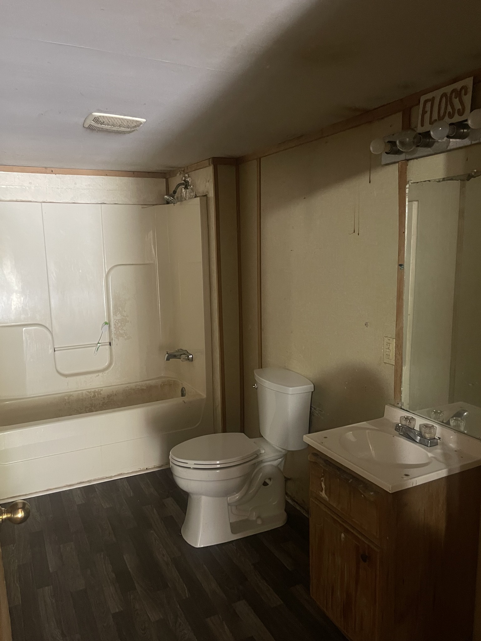 263 Reeves Street Lexington, TN 38351 - Photo 13 of 19 a bathroom with a sink a toilet and shower
