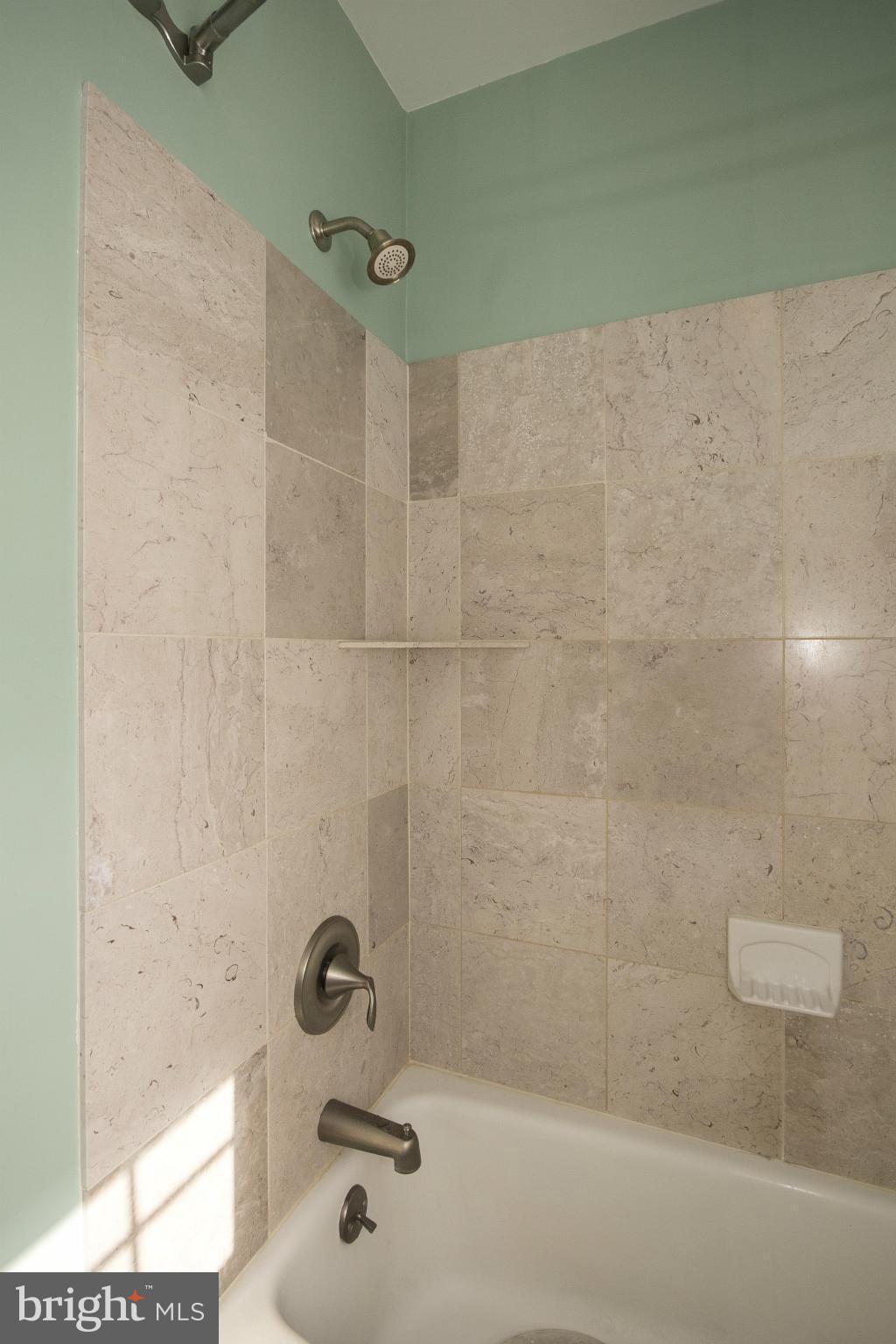 826 Maxa Road Aberdeen, MD 21001 - Photo 24 of 30 Remodeled Bath with marble floor and tub surround