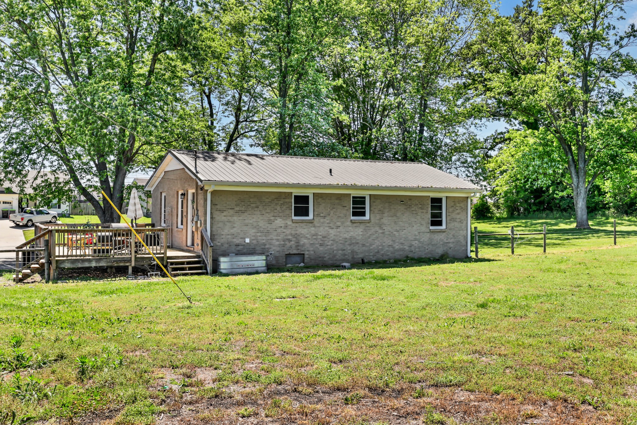 1068 Hugh Hunter Road Oak Grove, KY 42262 - Photo 28 of 30 a view of a house with a yard and sitting area