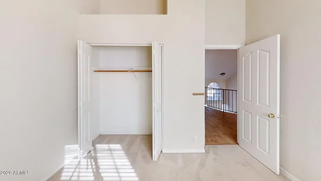 a view of bathroom with a sink and a mirror