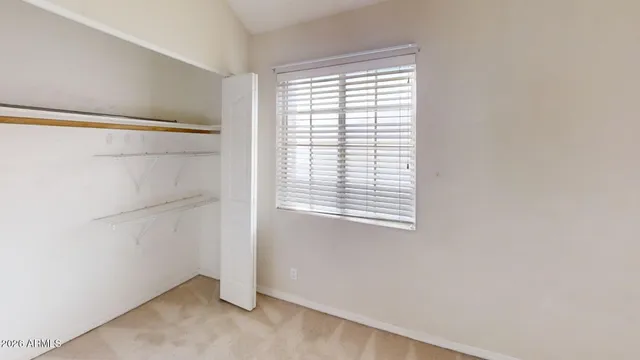 a view of a room that has a window in it