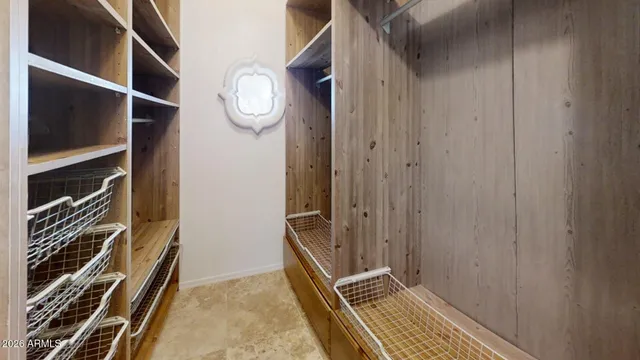 a view of room with wooden floor