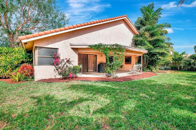 front view of a house with a patio