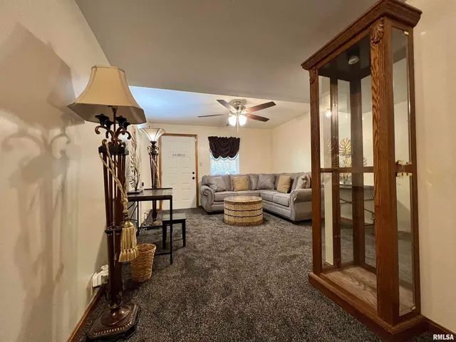 a spacious bathroom with a sink and a mirror