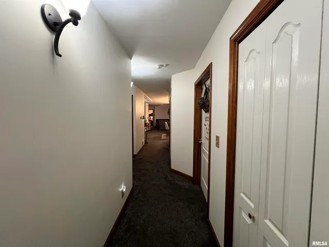 a view of a livingroom from a hallway