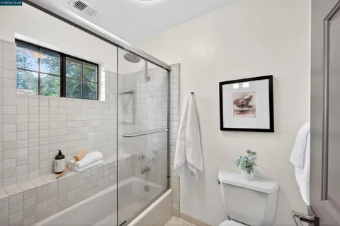 a front view of house with yard and outdoor seating