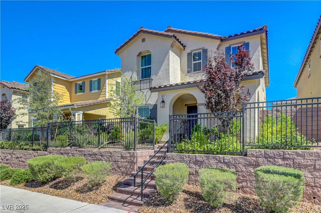 3637 Modico Lane Henderson, NV 89044 - Photo 2 of 62 Mediterranean / spanish house featuring stucco sid