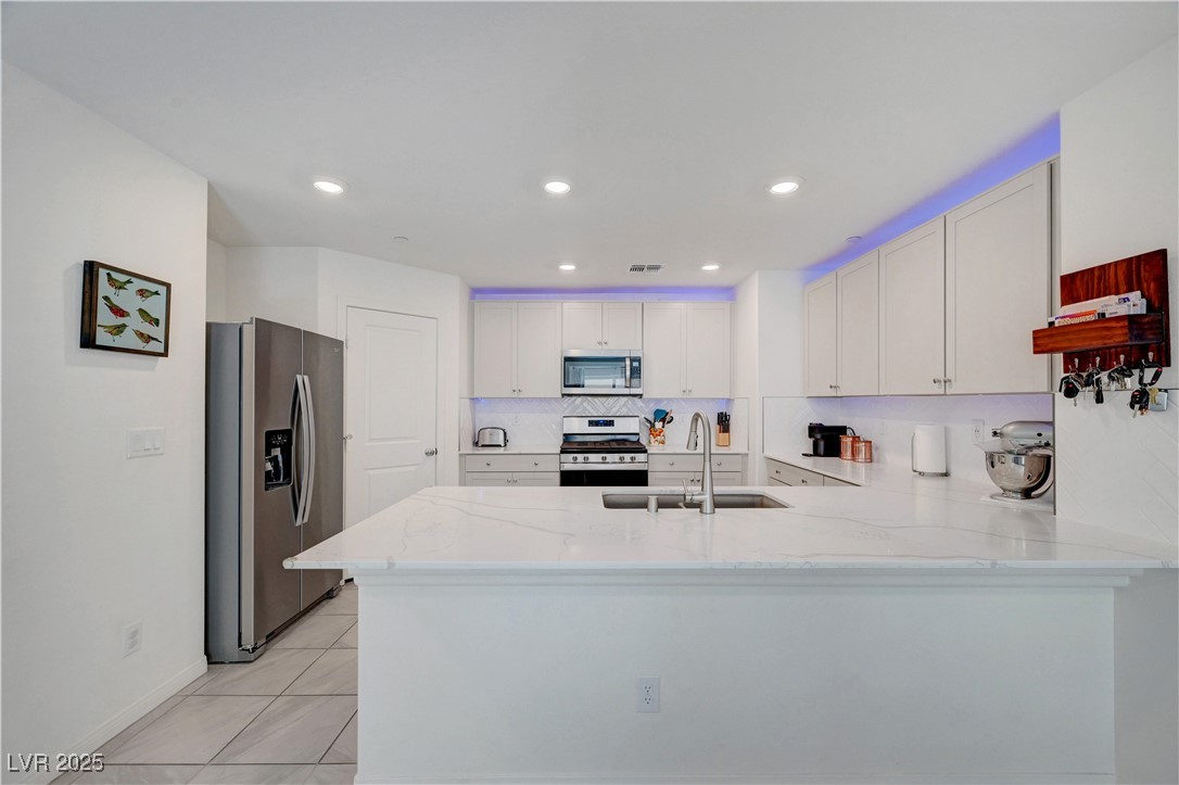 3637 Modico Lane Henderson, NV 89044 - Photo 21 of 62 Kitchen featuring appliances with stainless steel