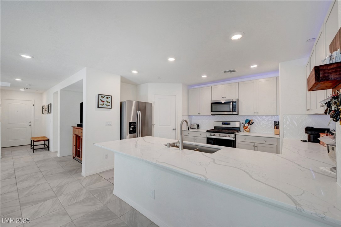 3637 Modico Lane Henderson, NV 89044 - Photo 22 of 62 Kitchen with appliances with stainless steel finis