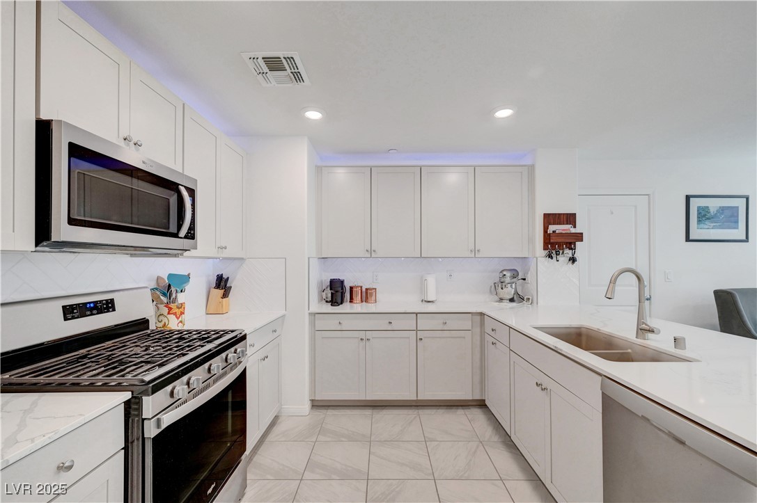 3637 Modico Lane Henderson, NV 89044 - Photo 25 of 62 Kitchen with appliances with stainless steel finis