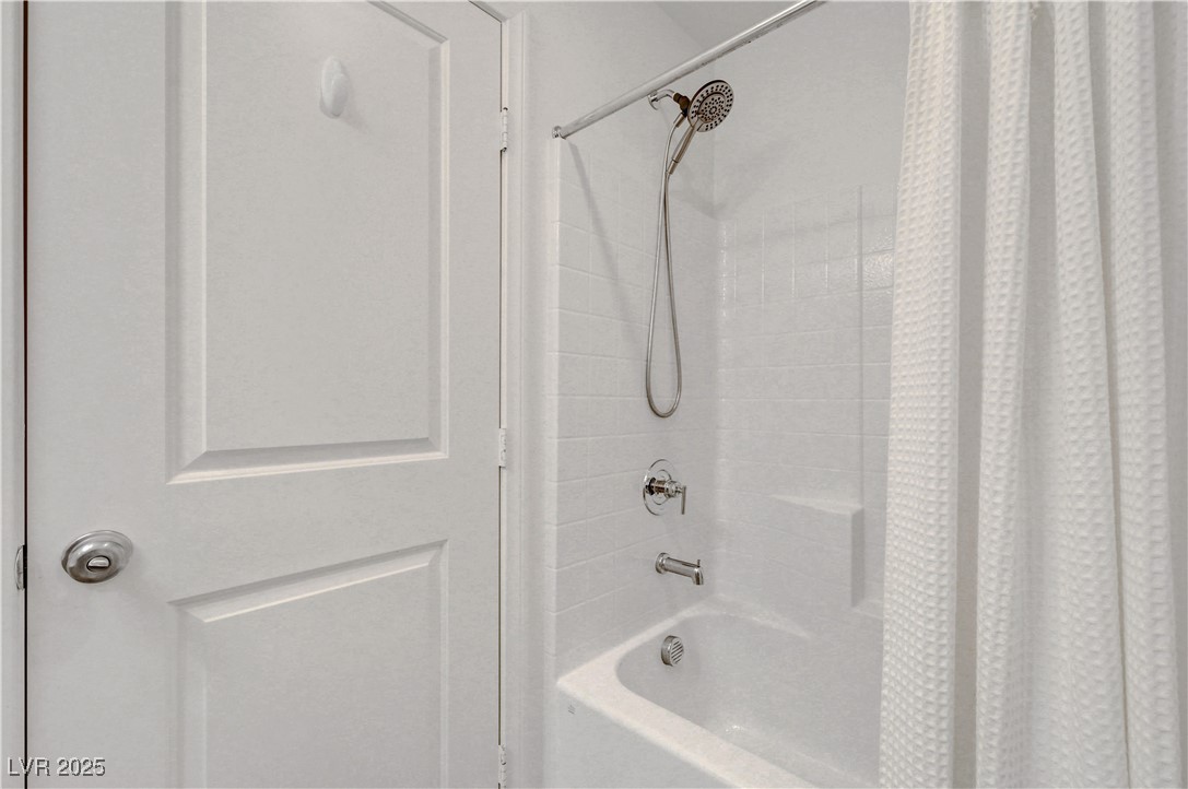 3637 Modico Lane Henderson, NV 89044 - Photo 39 of 62 Bathroom with shower / bath combination with curta