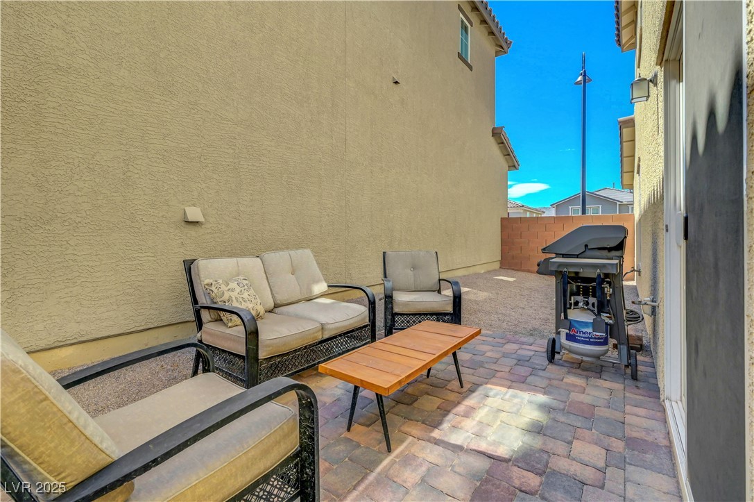 3637 Modico Lane Henderson, NV 89044 - Photo 53 of 62 View of patio featuring a grill and an outdoor han