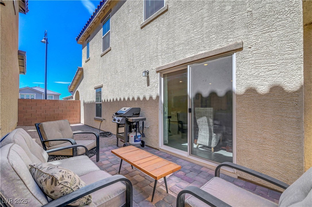 3637 Modico Lane Henderson, NV 89044 - Photo 54 of 62 Fenced backyard with grilling area and a patio are